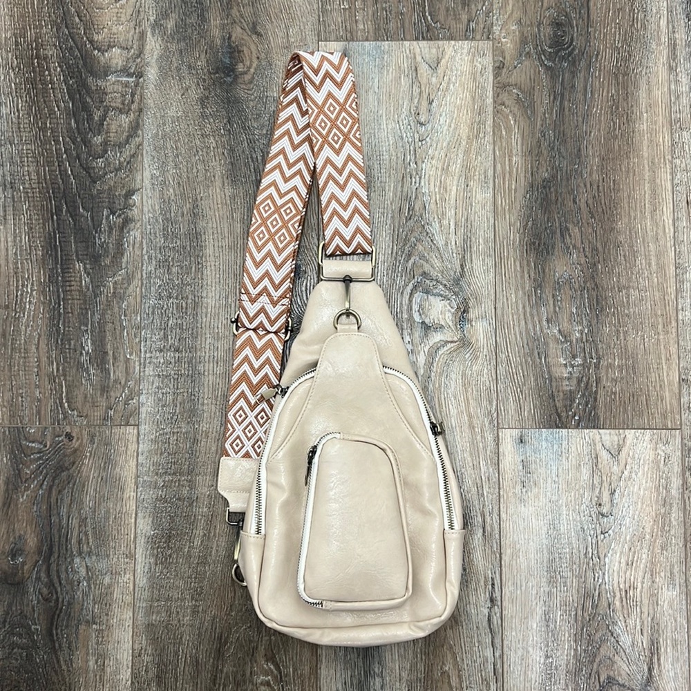 Sling crossbody neutral bag